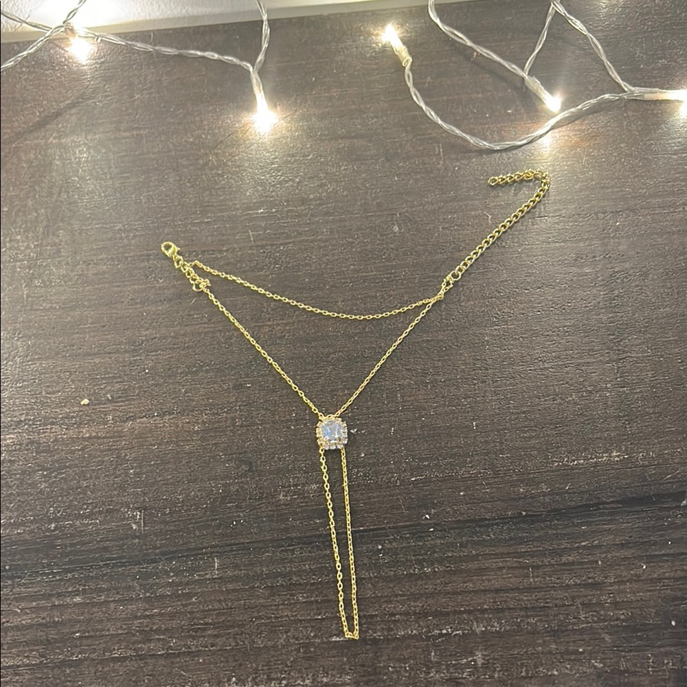 Elegant Gold Bracelet with Crystal Pendant